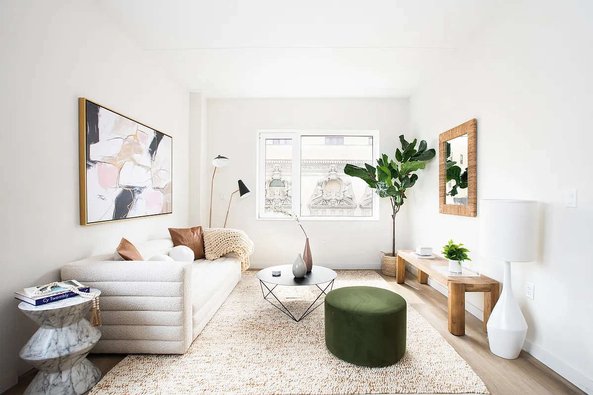 8 Palmetto Street, Unit 510 Brooklyn, NY 11221 - Photo 2 of 23 a living room with furniture and a potted plant