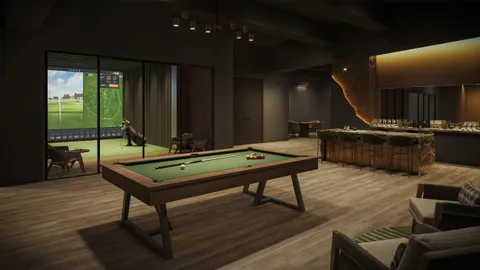 a room with furniture pool table and windows