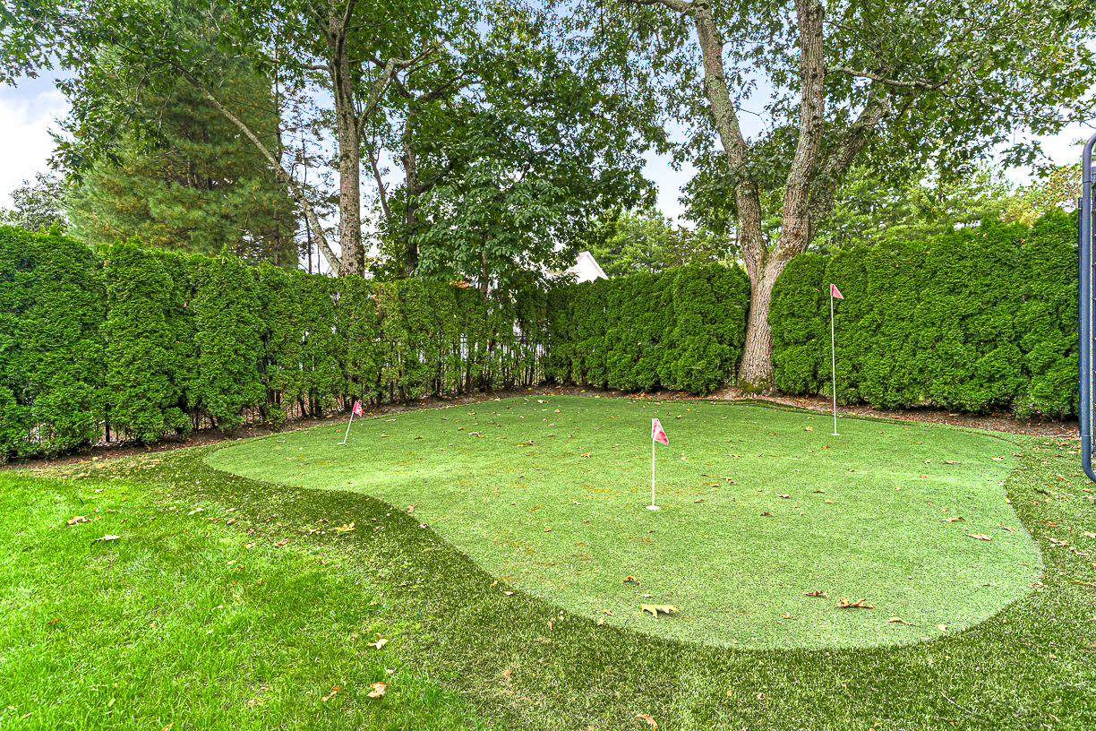 165 Bridle Trail Road Needham, MA 02492 - Photo 14 of 21 a swimming pool with trees in the background
