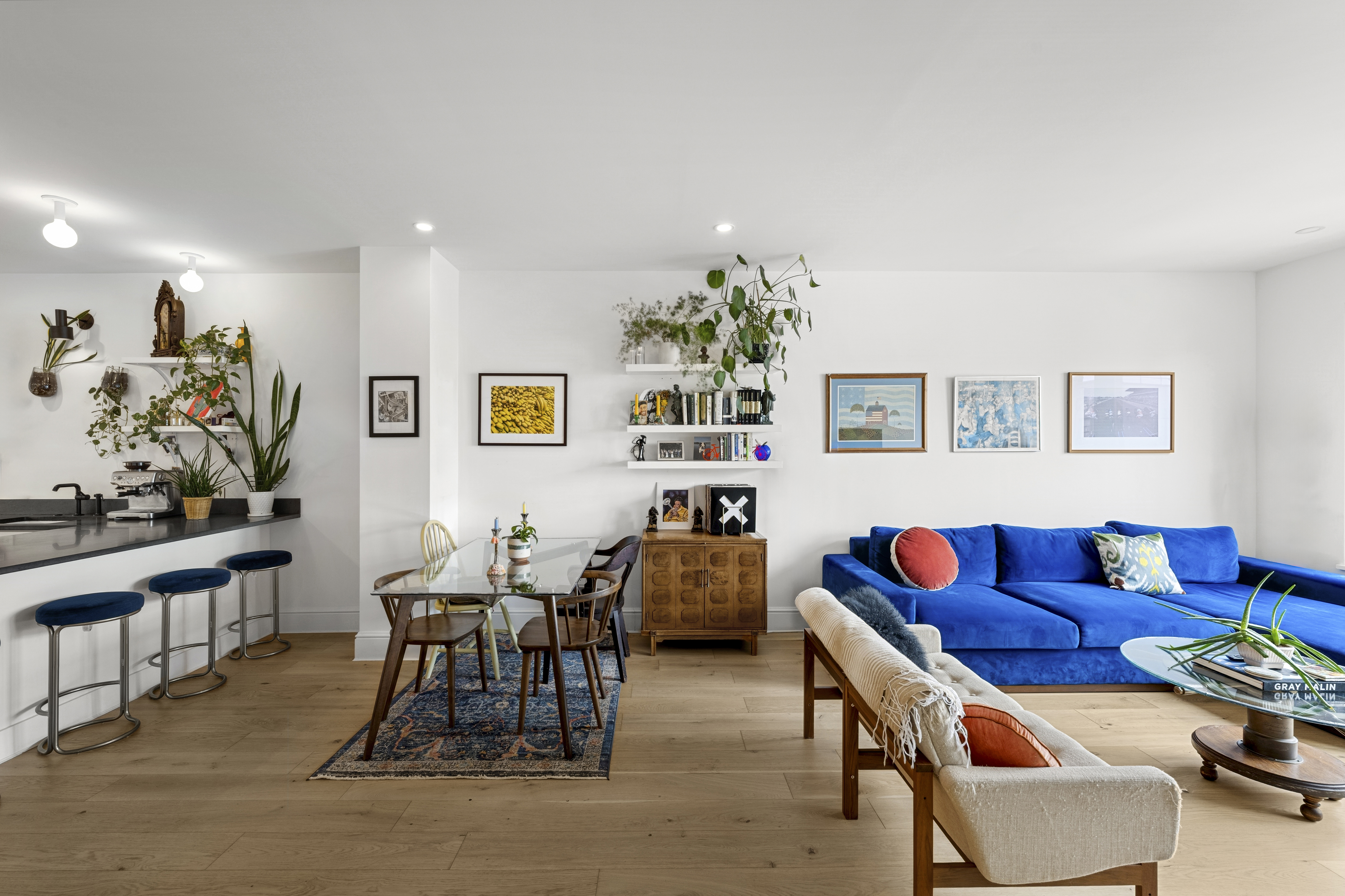488 Sterling Place, Unit 4A Brooklyn, NY 11238 - Photo 2 of 13 a living room with furniture and paintings on the wall