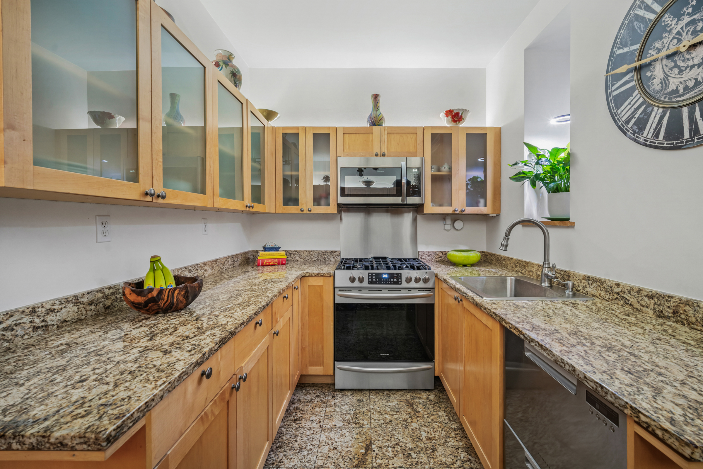 300 West 109th Street, Unit 2JK Manhattan, NY 10025 - Photo 9 of 18 a kitchen with stainless steel appliances granite countertop a sink stove and cabinets