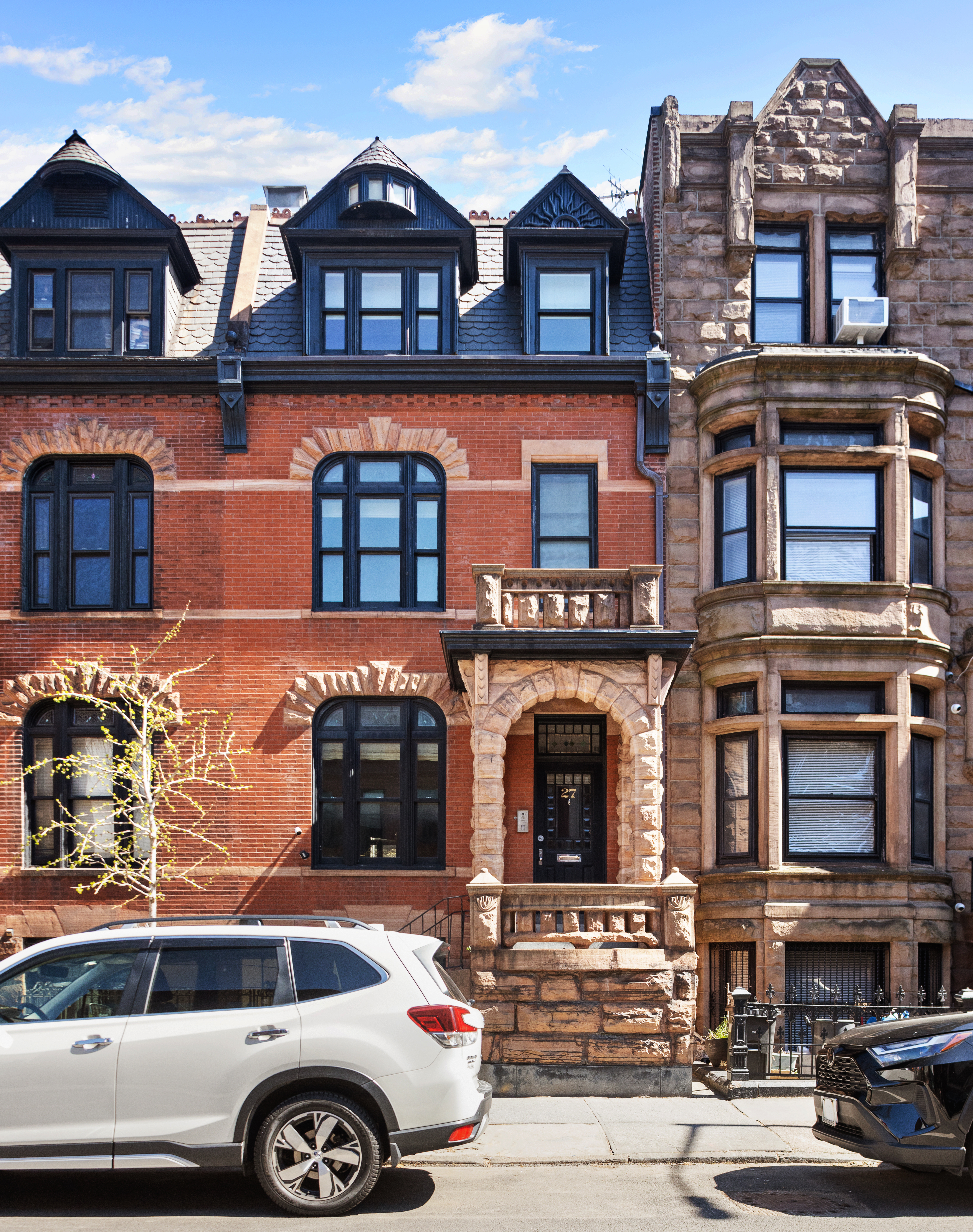 27 7th Avenue Brooklyn, NY 11217 - Photo 21 of 23 a front view of a building with parking space