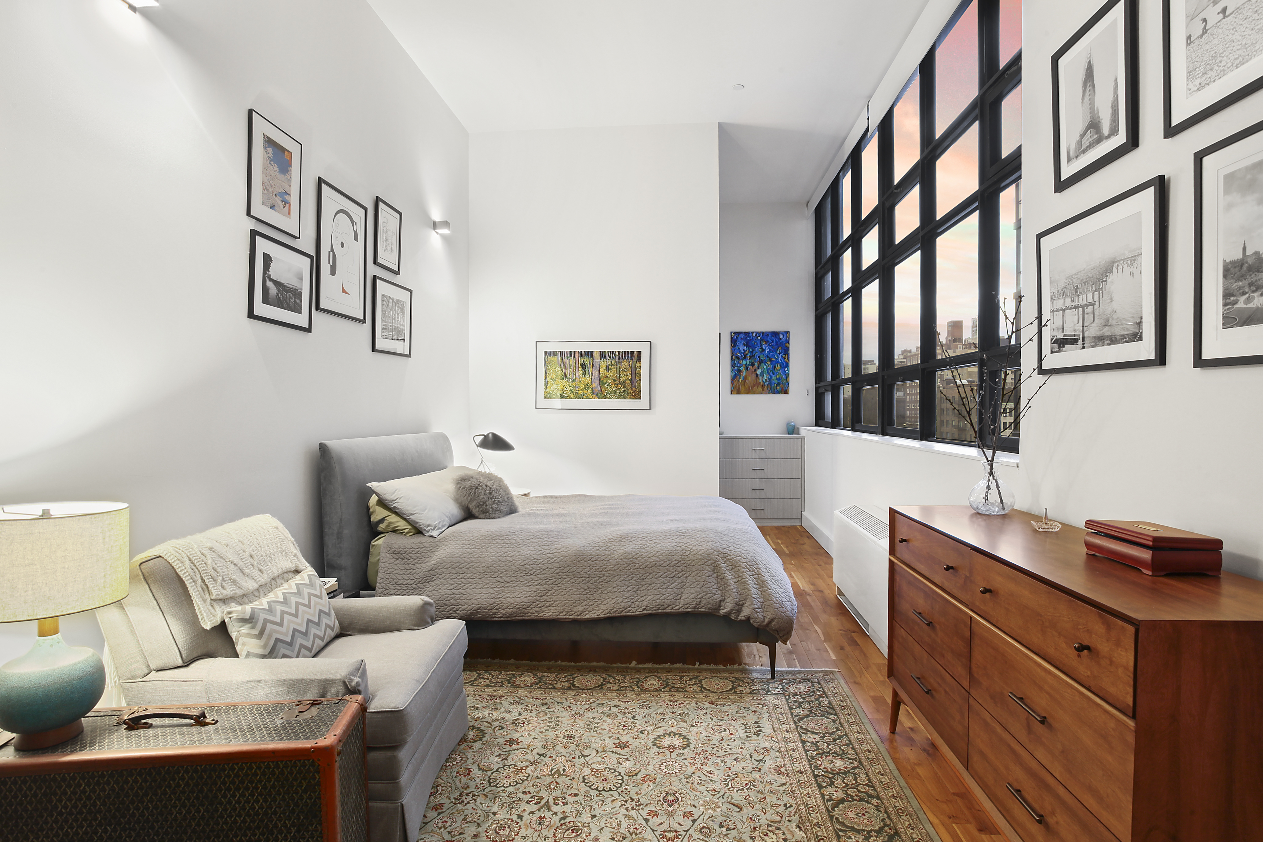 360 Furman Street, Unit 724 Brooklyn, NY 11201 - Photo 4 of 35 a bedroom with a bed and a desk