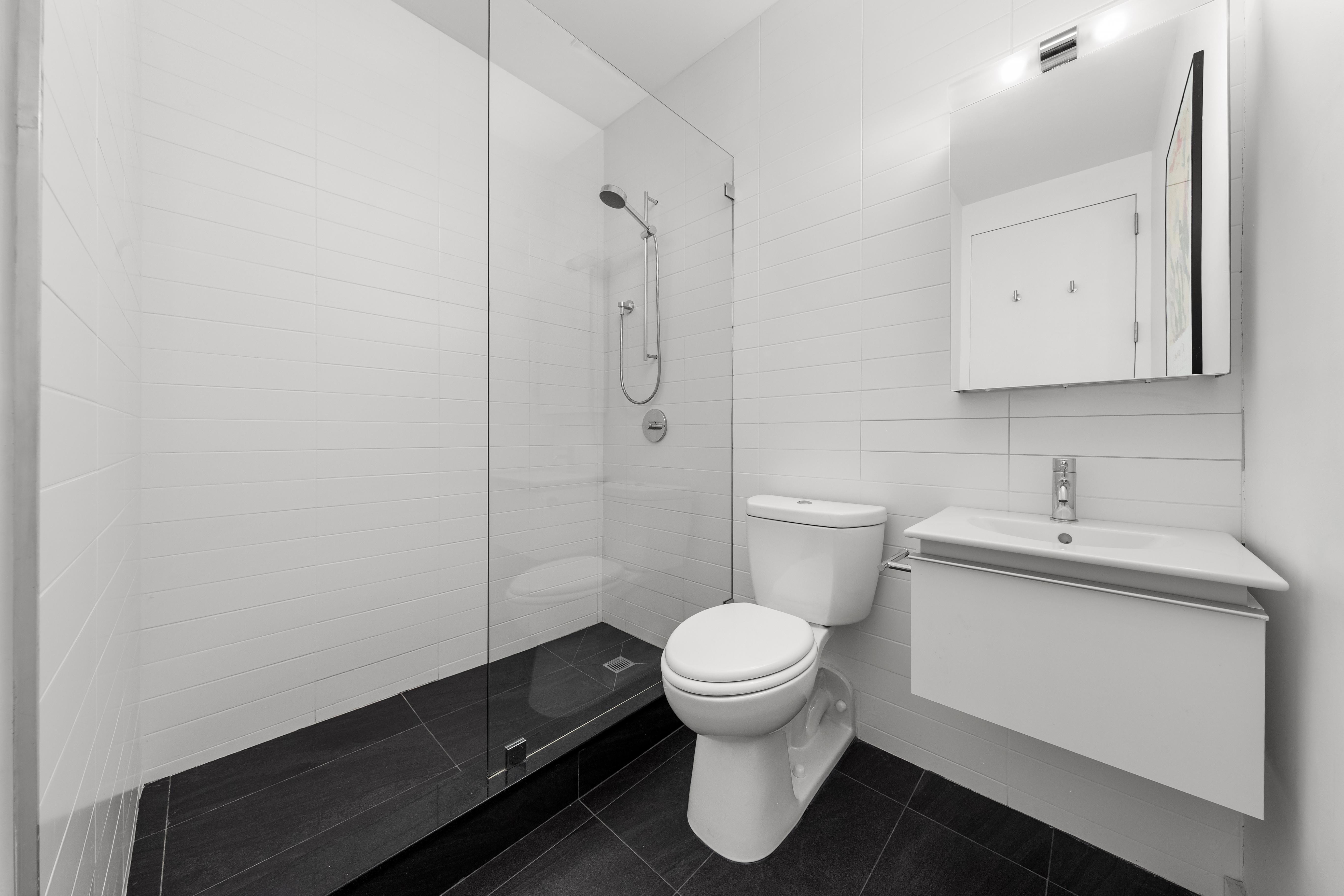 3 Wythe Lane Brooklyn, NY 11249 - Photo 17 of 30 a bathroom with a sink toilet and vanity