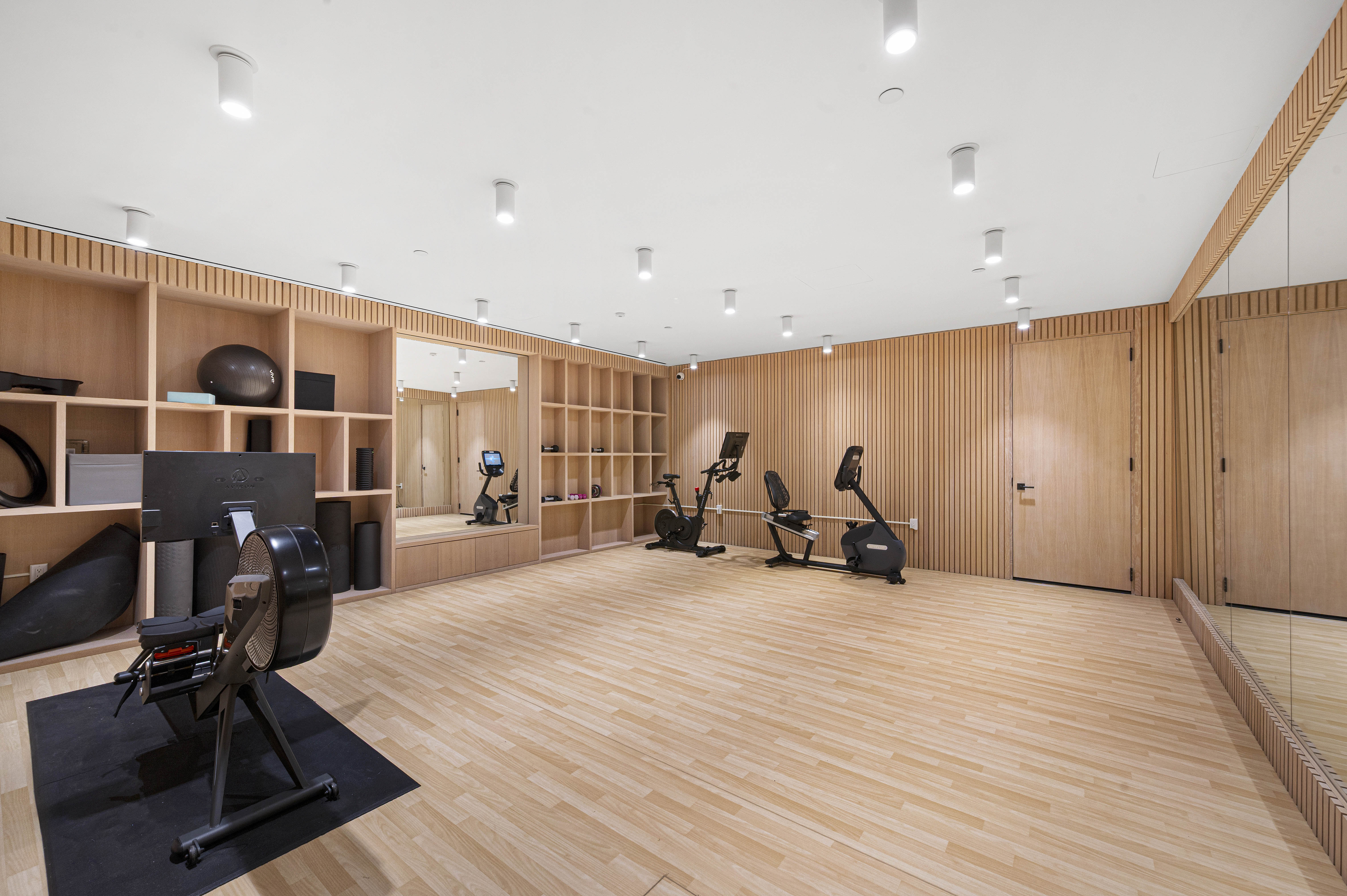 368 3rd Avenue, Unit 11A Manhattan, NY 10016 - Photo 16 of 17 a view of a room with gym equipment