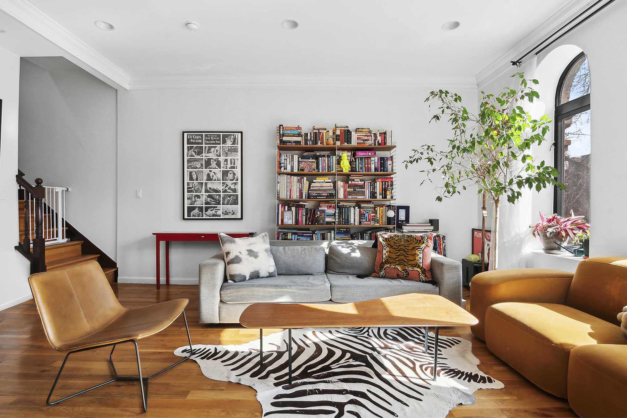 147 Herkimer Street, Unit 2 Brooklyn, NY 11216 - Photo 2 of 9 a living room with patio furniture and a potted plant