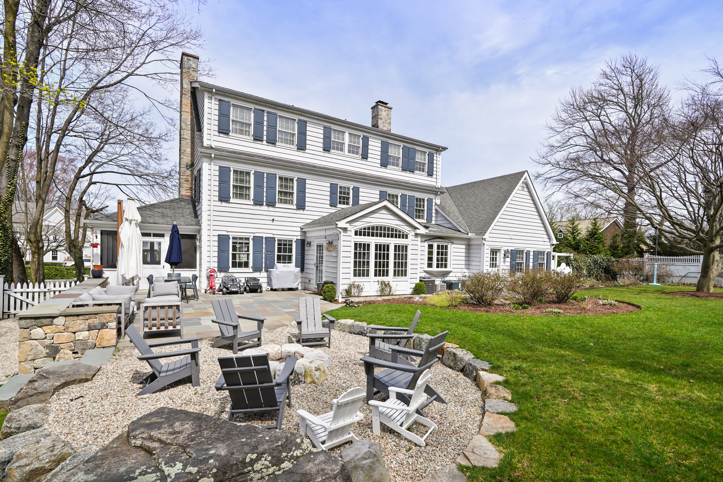 15 Anderson Road Greenwich, CT 06830 - Photo 25 of 30 a front view of a house with garden and porch