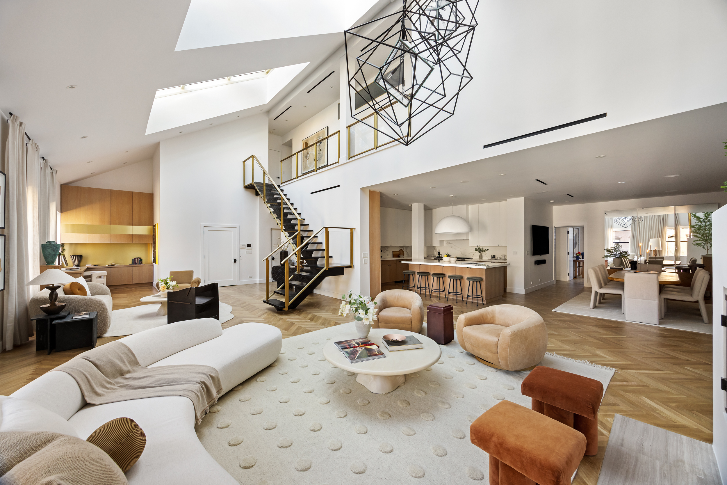 45 Warren Street, Unit PH Manhattan, NY 10007 - Photo 4 of 29 a living room with furniture and wooden floor