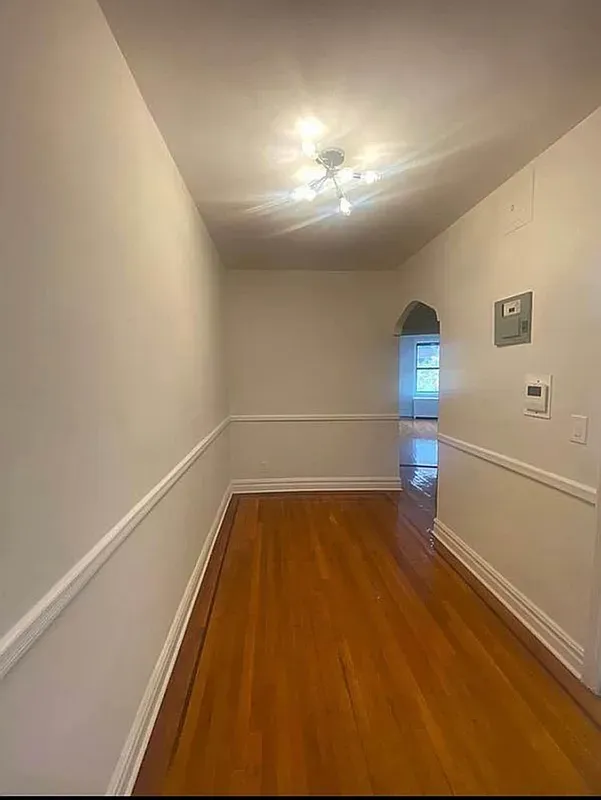 a view of a room with a window