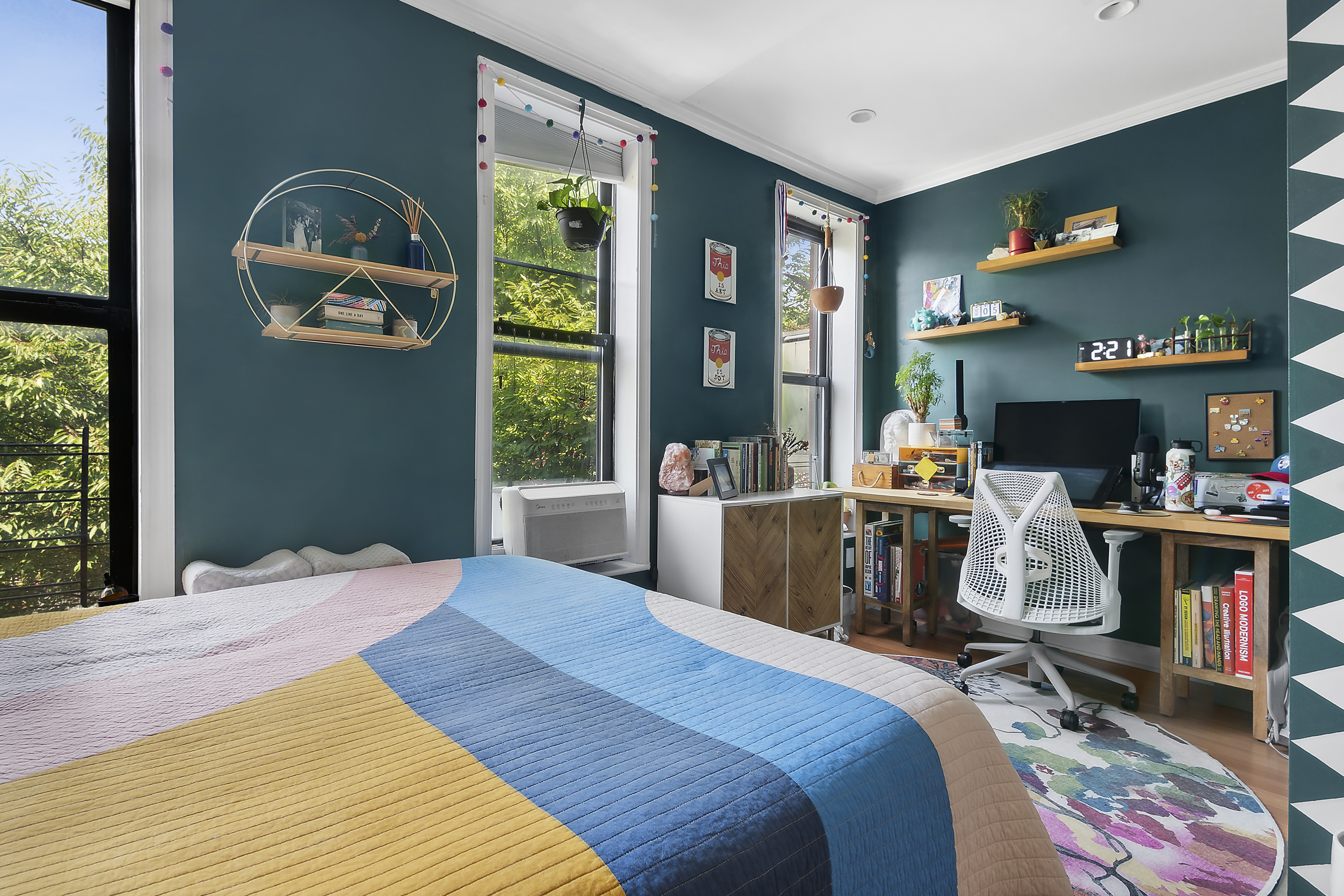 656 Union Street, Unit 2 Brooklyn, NY 11215 - Photo 2 of 12 a bed sitting in a bedroom next to a window