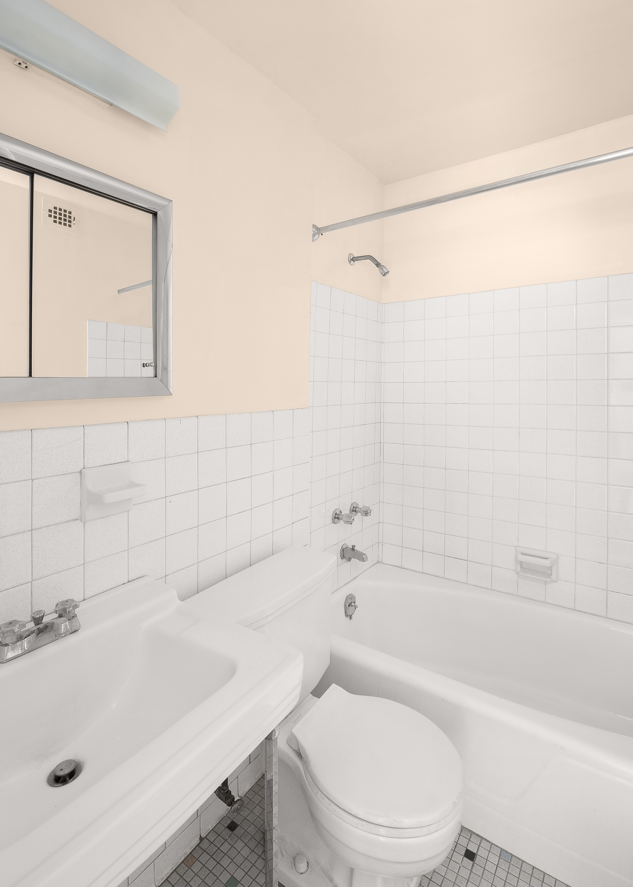 300 East 71st Street, Unit 5S Manhattan, NY 10021 - Photo 5 of 7 a bathroom with a bathtub a toilet a sink and a shower