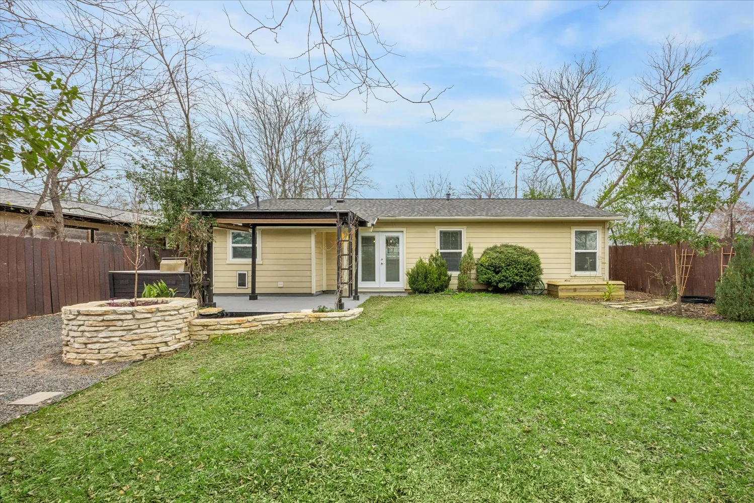 front view of a house with a yard