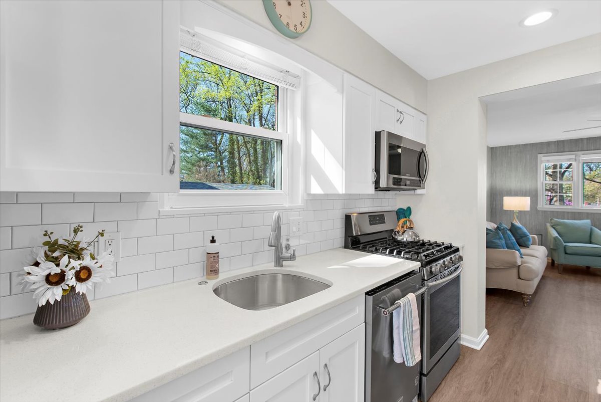 12712 Atherton Drive Silver Spring, MD 20906 - Photo 8 of 40 a kitchen that has a sink and a stove