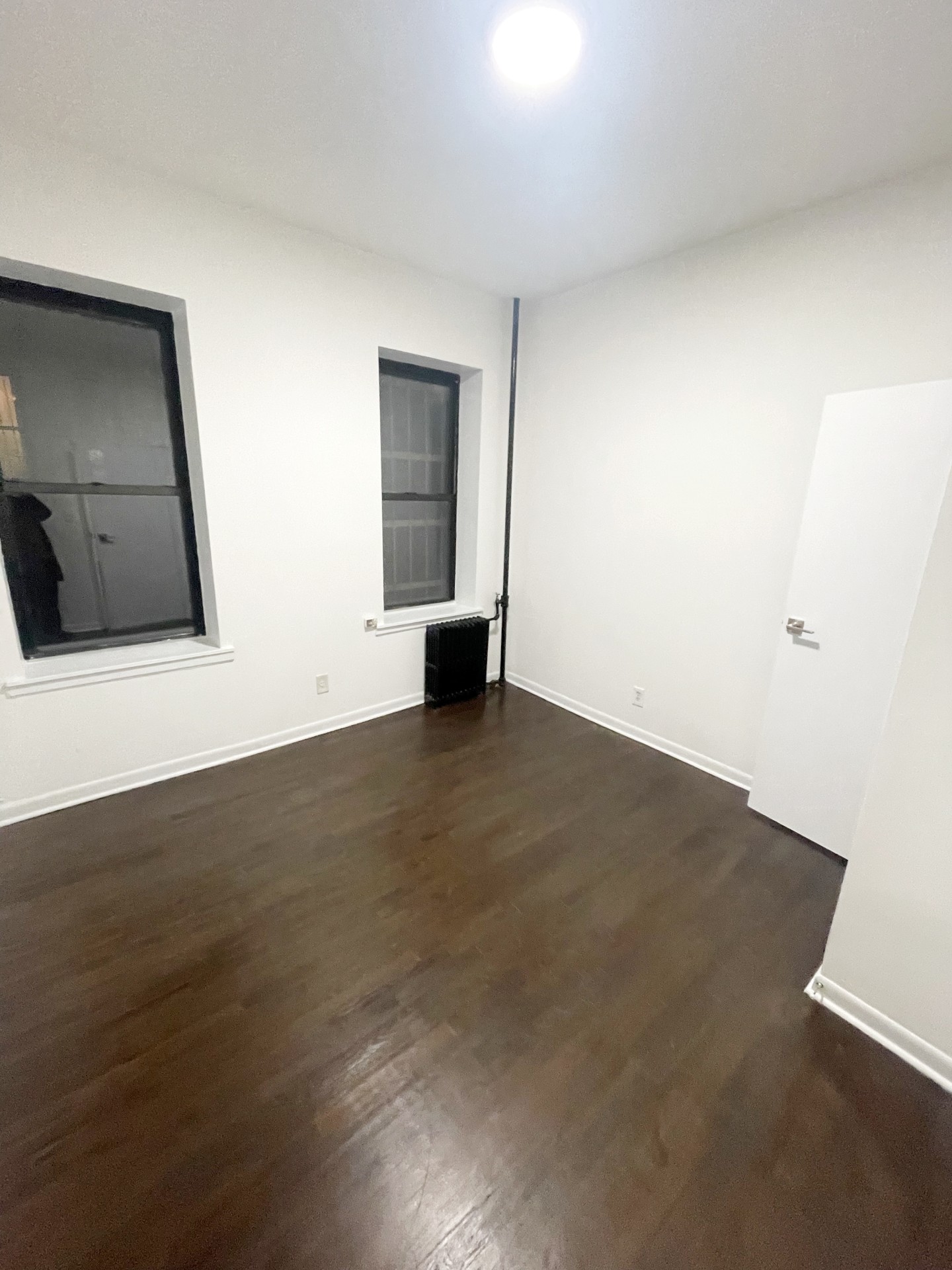 336 East 5th Street, Unit 1RE Manhattan, NY 10003 - Photo 3 of 5 a view of an empty room