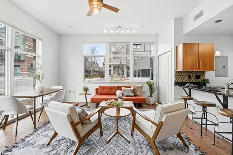 a outdoor space with furniture lots of tables and chairs