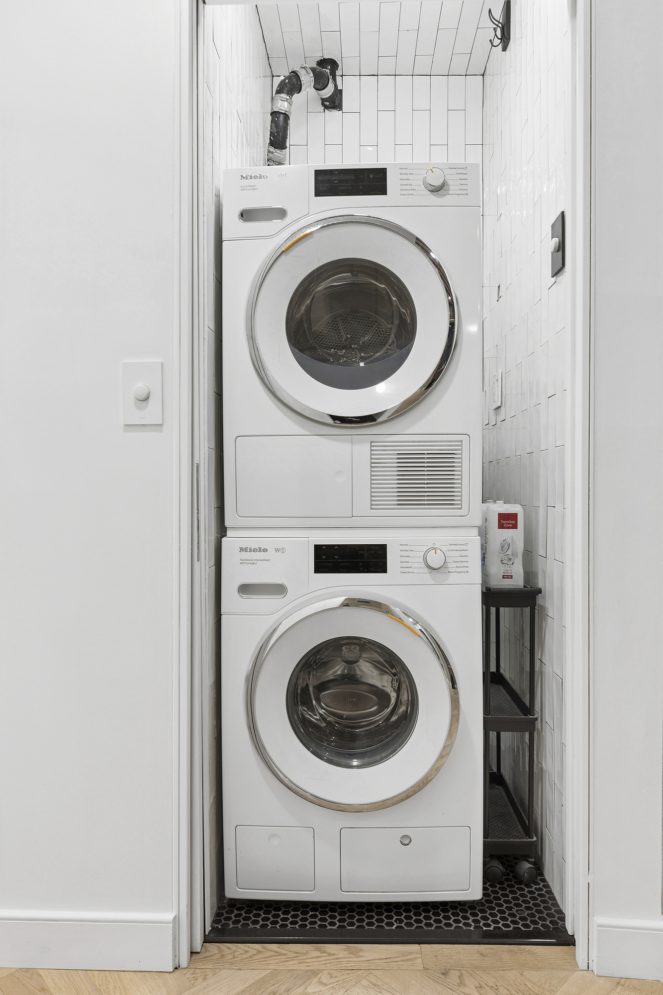 248 East 7th Street, Unit 3/4 Manhattan, NY 10009 - Photo 9 of 11 a utility room with dryer and washer