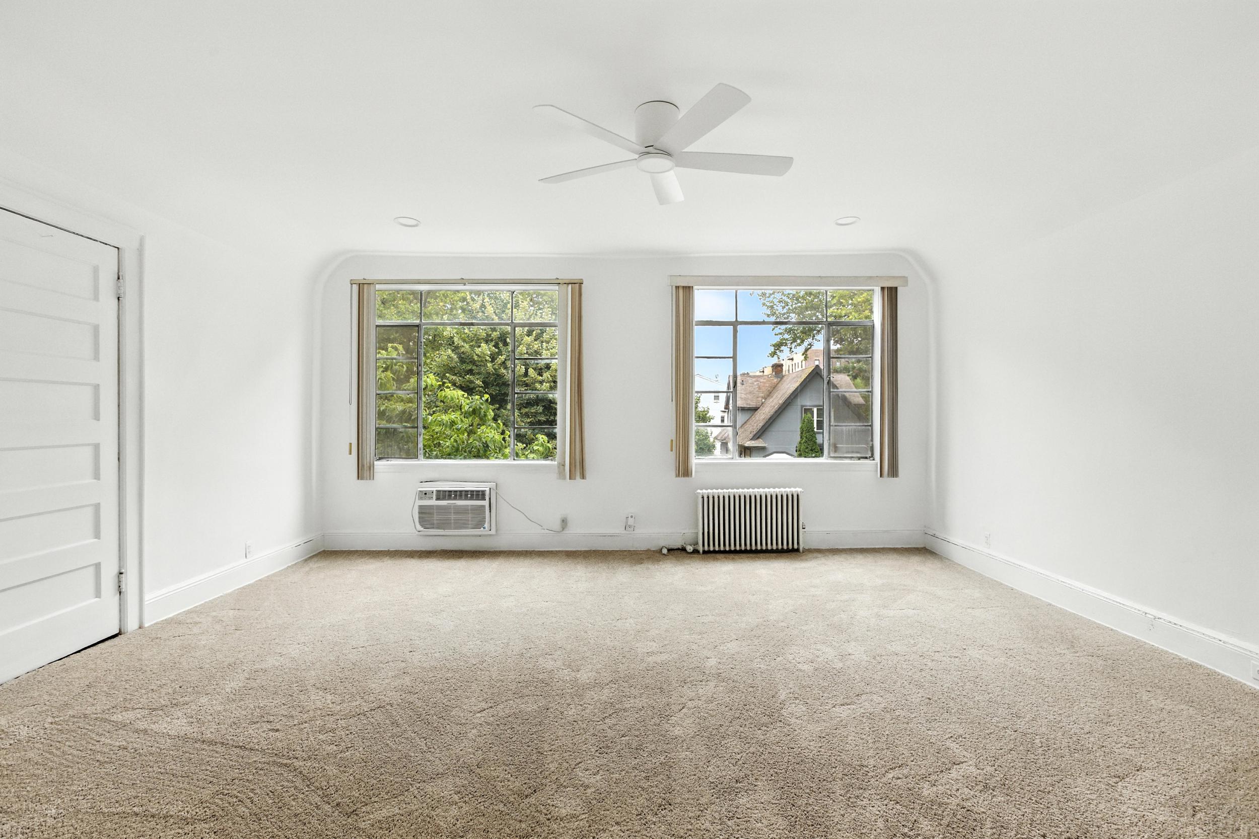 1070 East 13th Street Brooklyn, NY 11230 - Photo 10 of 18 an empty room with windows