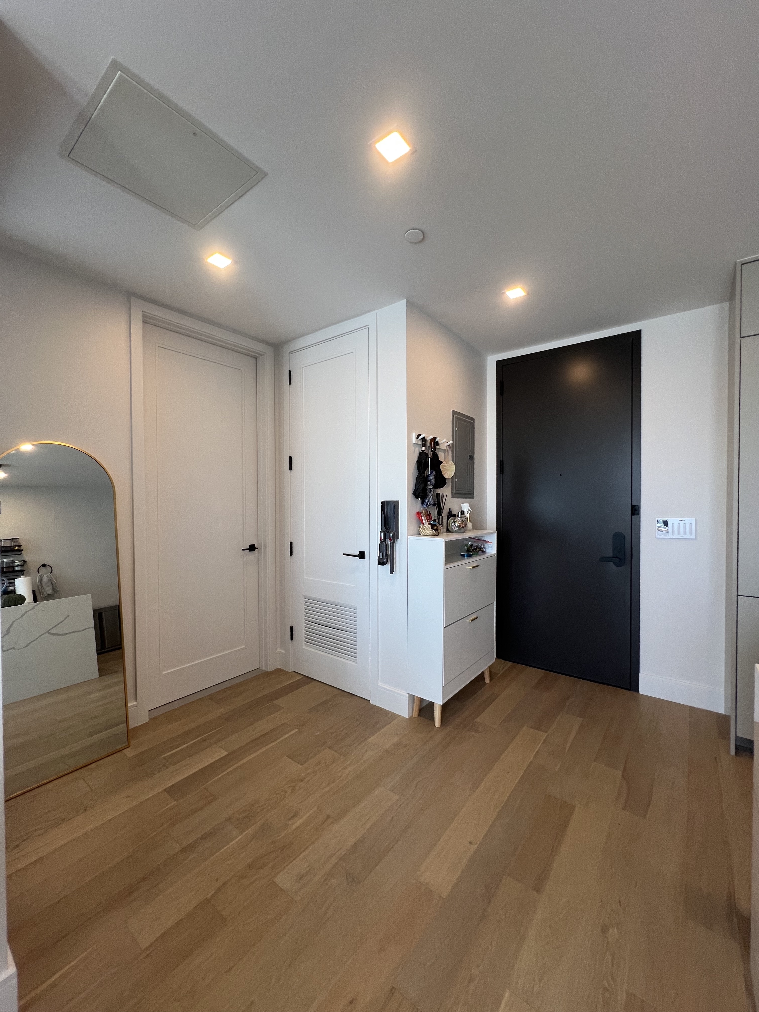 37-34 33rd Street, Unit 7H Queens, NY 11101 - Photo 6 of 18 a view of a livingroom with a staircase