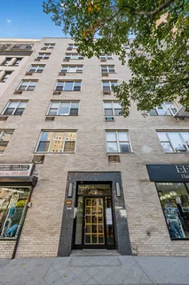 an aerial view of a brick building