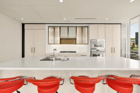 a kitchen with a stove and a microwave