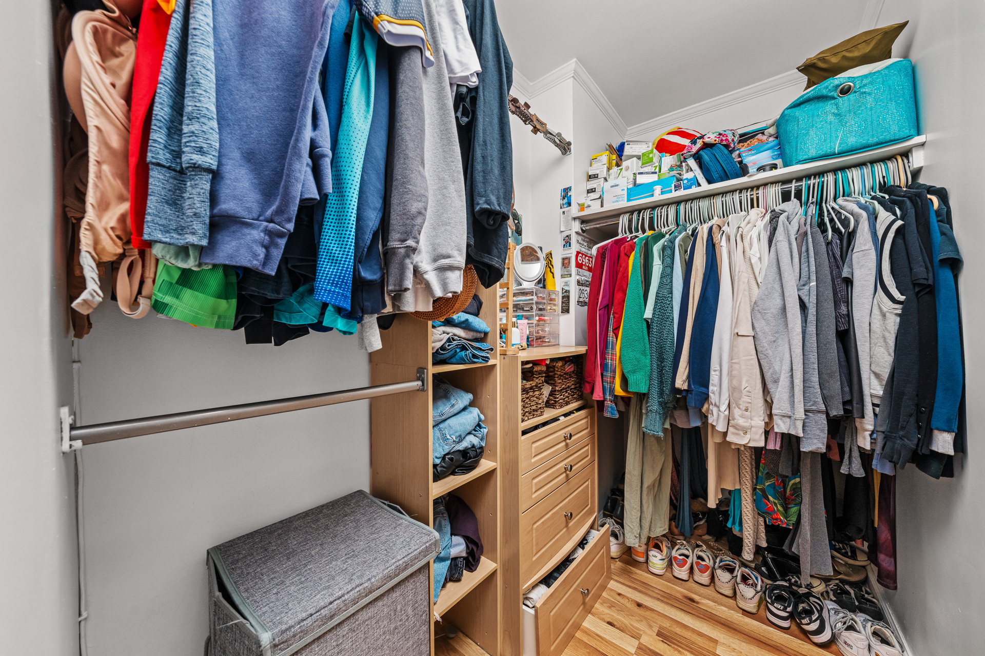 122 Ashland Place, Unit 14F Brooklyn, NY 11201 - Photo 7 of 16 a view of walk in closet with clothes and shoes