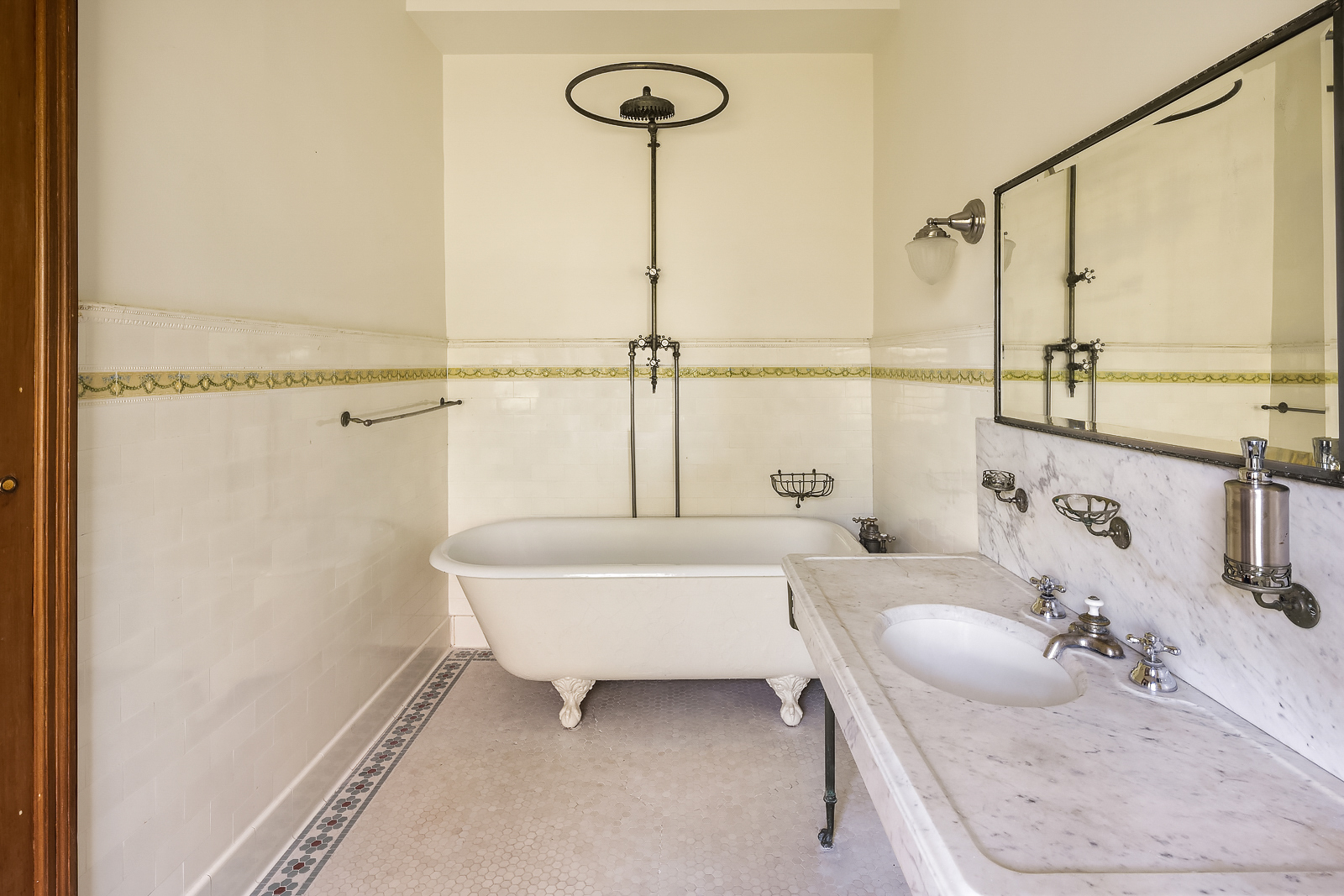 18 Prospect Park West Brooklyn, NY 11215 - Photo 30 of 40 a bathroom with a granite countertop sink a mirror and a shower