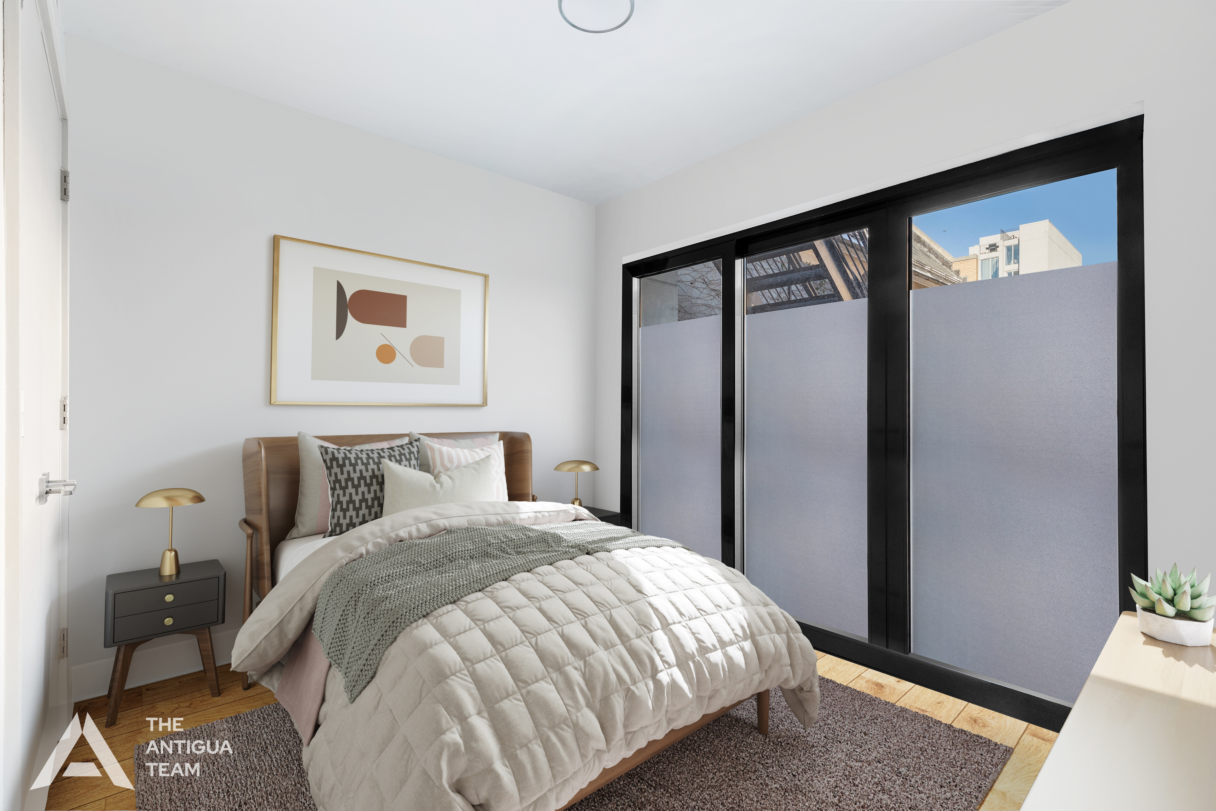 167 Eagle Street, Unit 1B Brooklyn, NY 11222 - Photo 4 of 13 a bed sitting in a bedroom next to a window