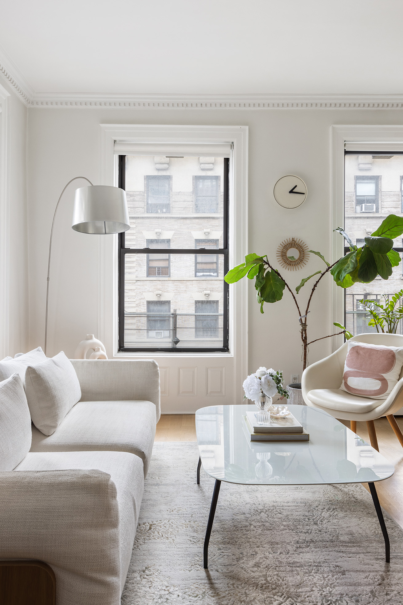 229 West 97th Street, Unit 5M New York, NY 10025 - Photo 3 of 11 a living room with furniture and wooden floor