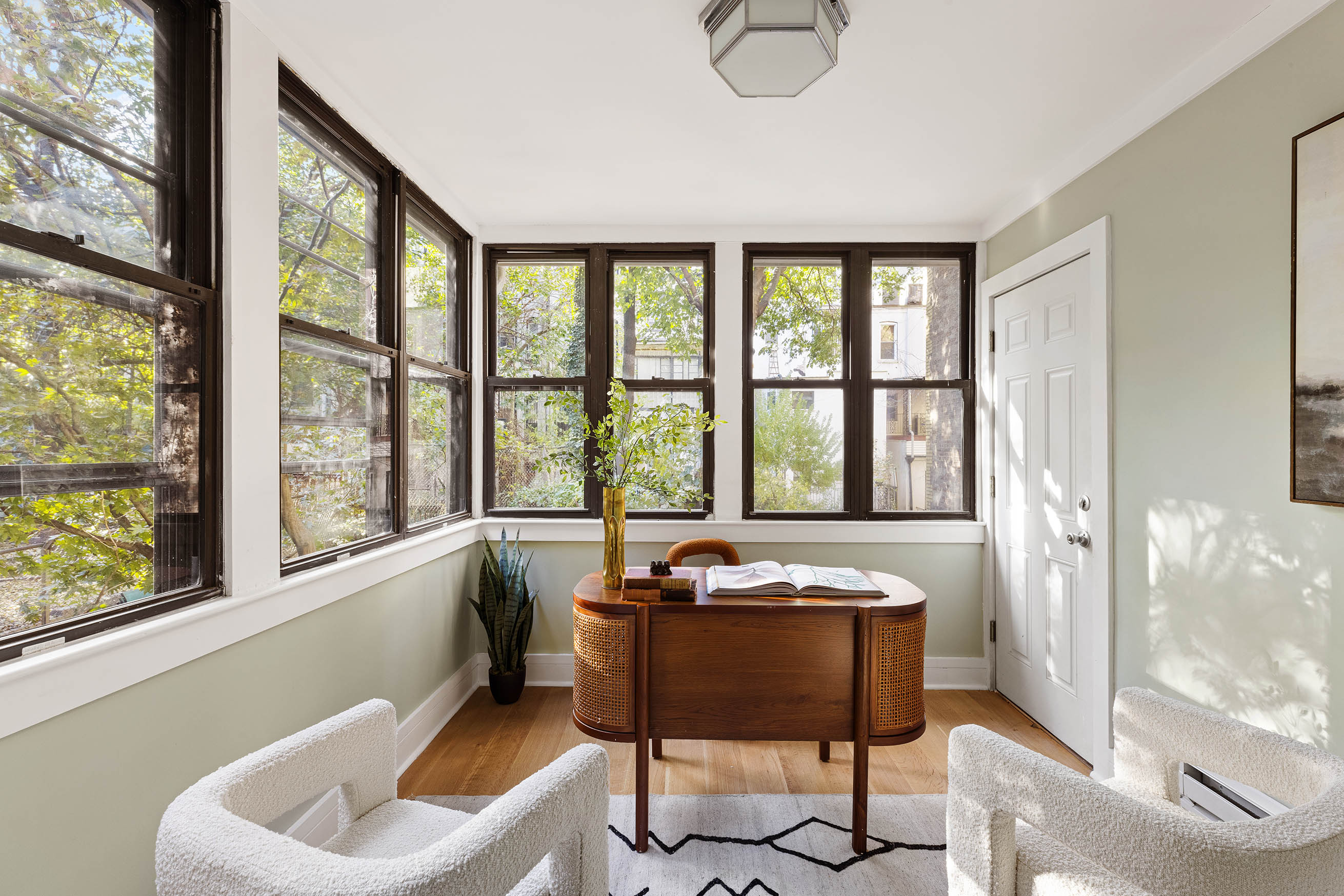 614 West 146th Street, Unit 4FAM Manhattan, NY 10031 - Photo 10 of 18 a living room with furniture and a large window