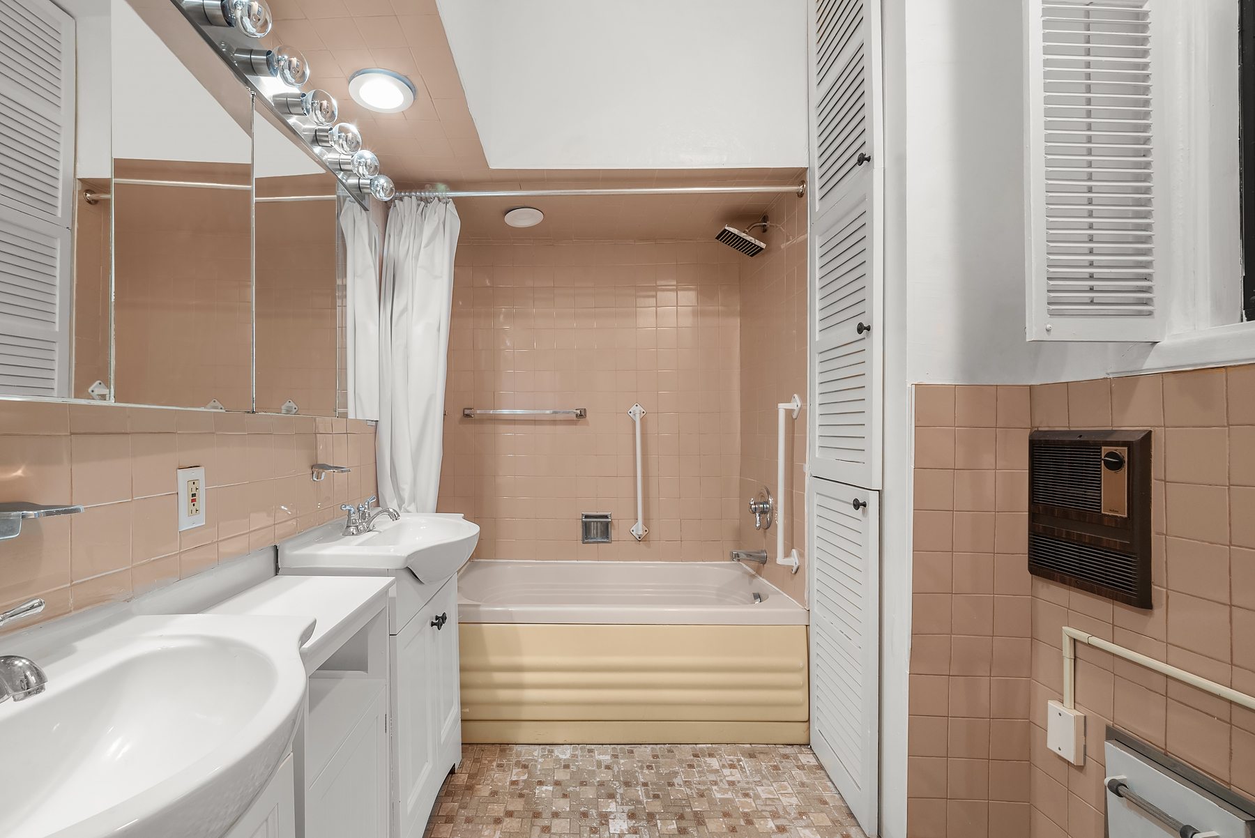 862 West End Avenue, Unit GARDEN Manhattan, NY 10025 - Photo 9 of 13 a bathroom with a sink and a mirror