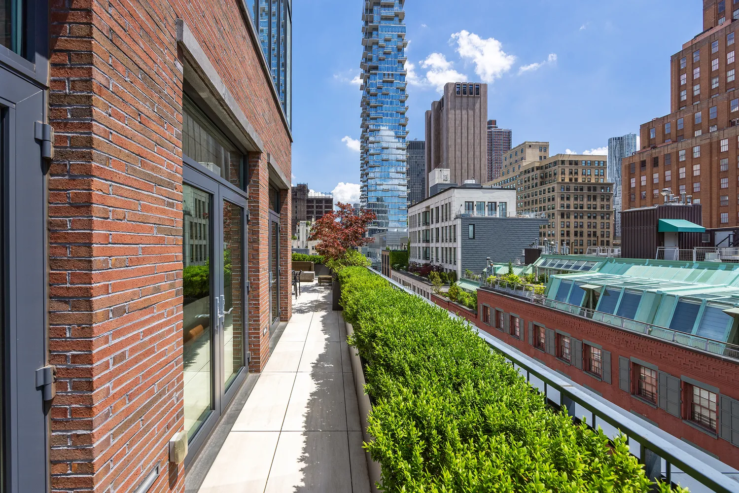 a view of a city with tall buildings