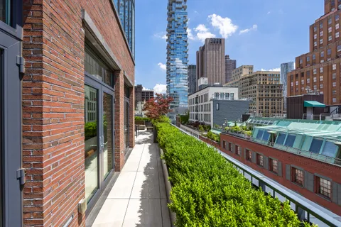 a view of a city with tall buildings