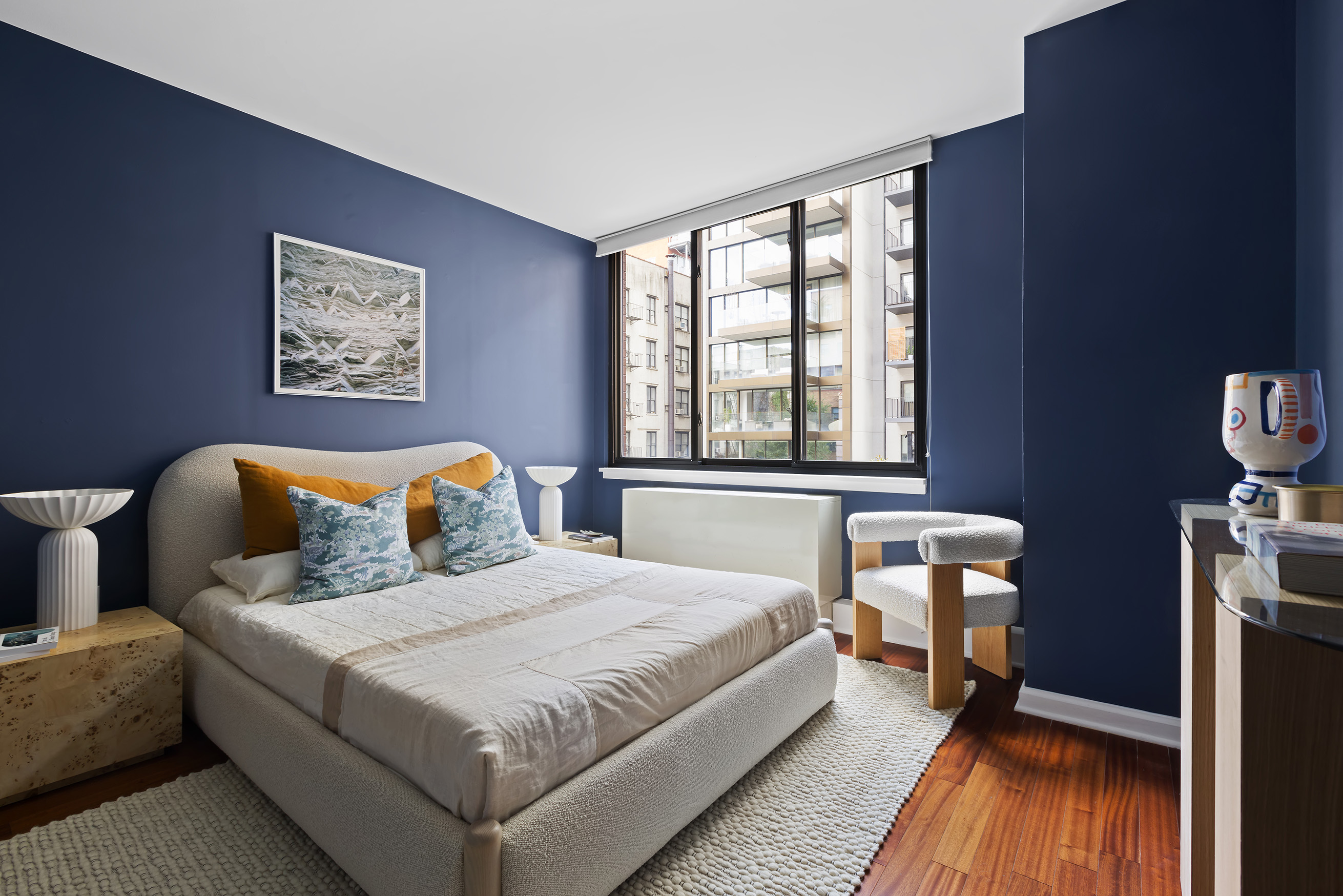 199 Bowery, Unit 3D Manhattan, NY 10002 - Photo 8 of 12 a bedroom with bed and window