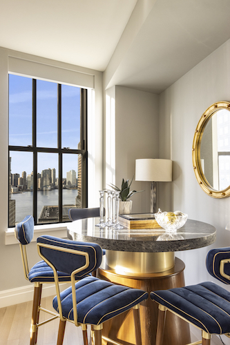 100 Barclay Street, Unit 15P Manhattan, NY 10007 - Photo 12 of 34 a room with a table chairs and a view of living room