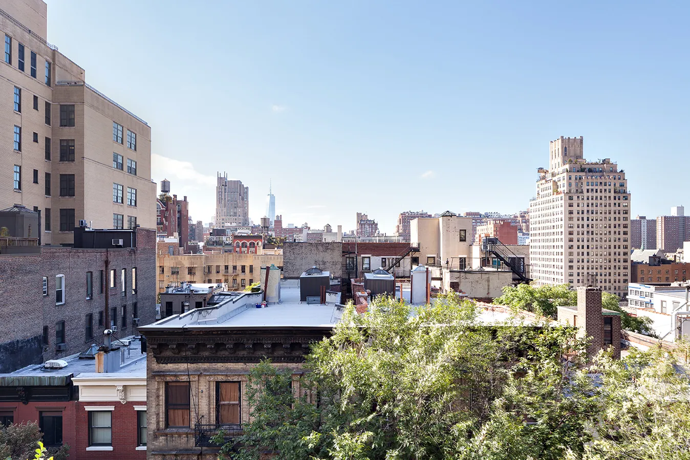 a view of a city with tall buildings