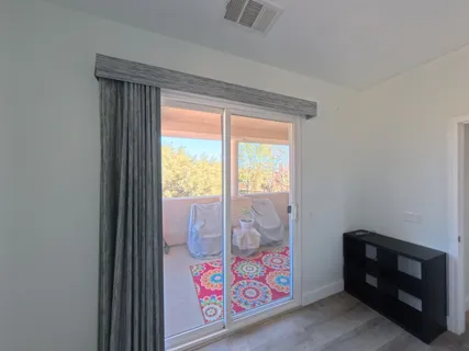 a room with toys and two windows