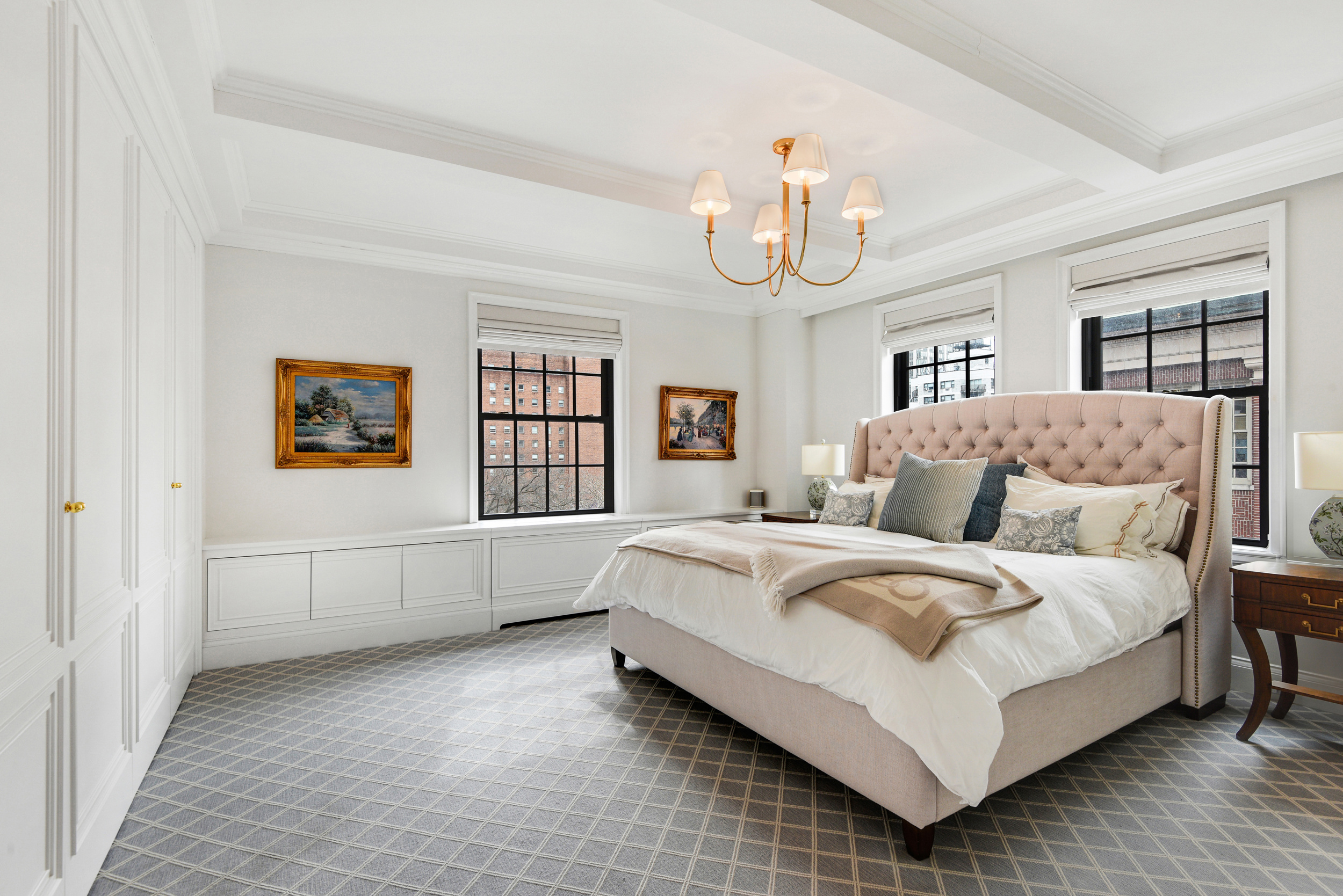 333 East 68th Street, Unit 6C Manhattan, NY 10065 - Photo 8 of 13 a spacious bedroom with a bed and window