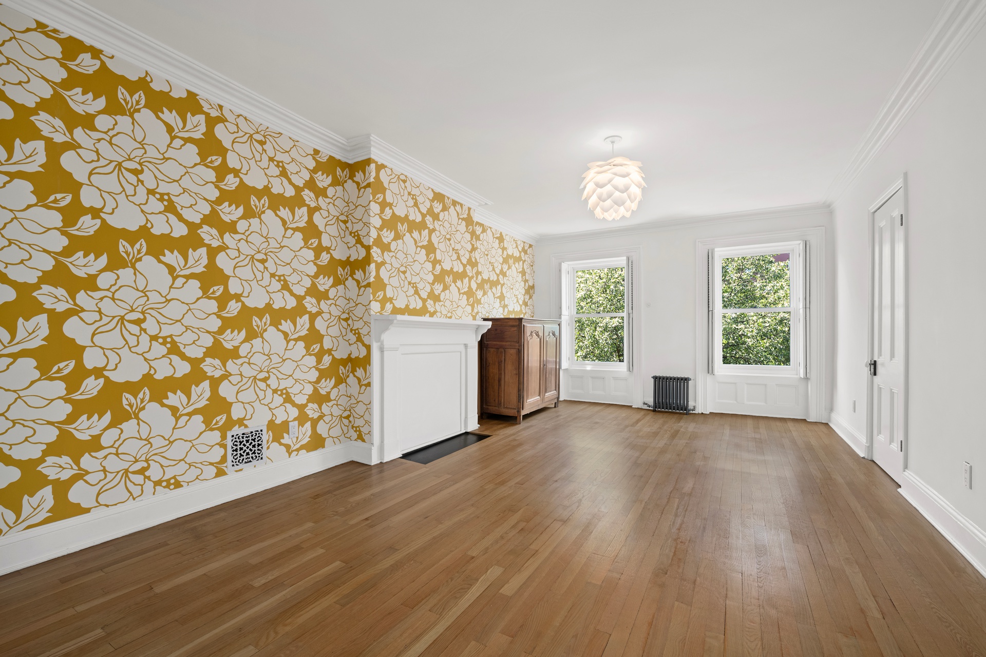 73 St James Place, Unit 2 Brooklyn, NY 11238 - Photo 9 of 15 wooden floor in an empty room with a window