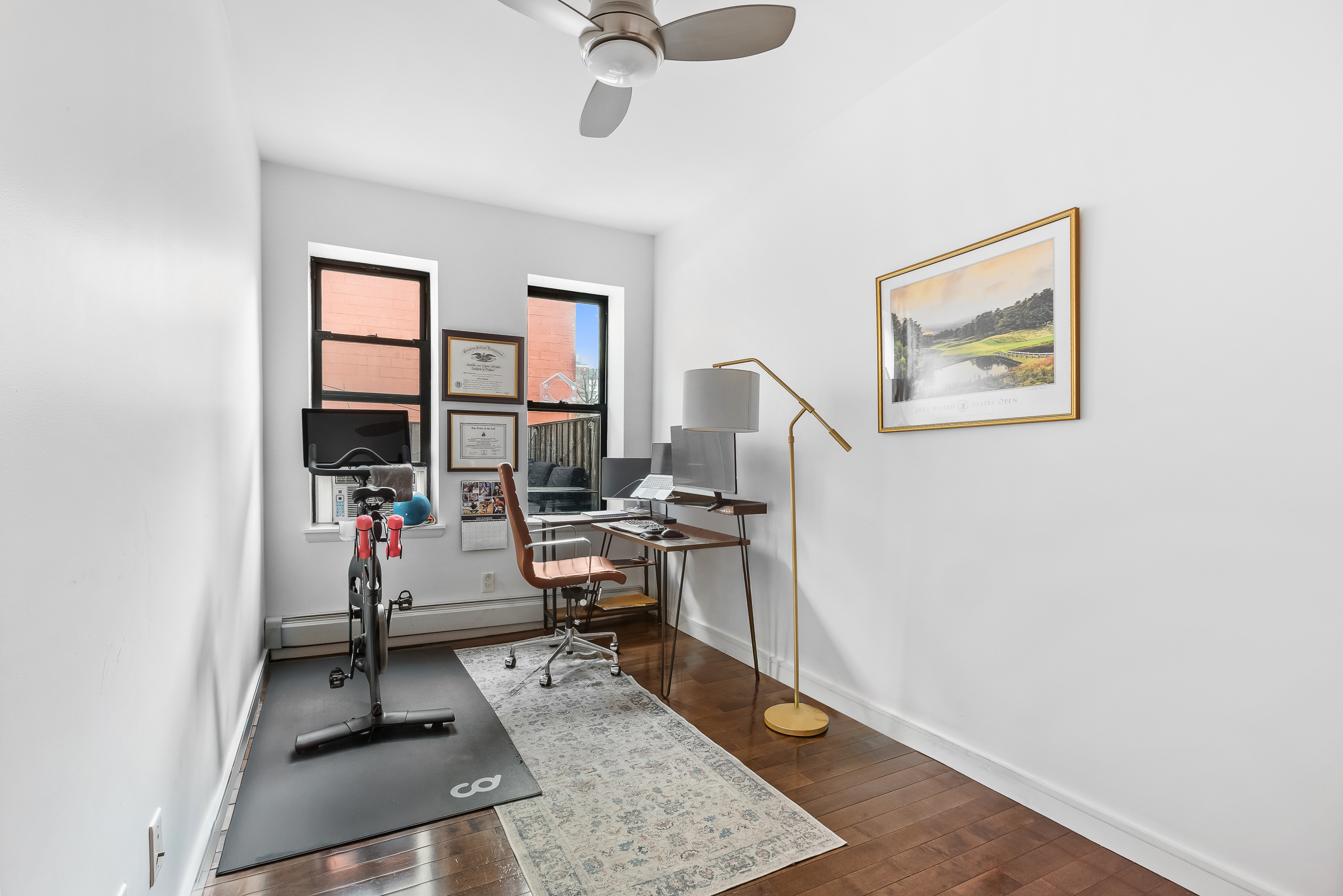 185 Smith Street Brooklyn, NY 11201 - Photo 9 of 14 a view of a workspace with furniture and a window