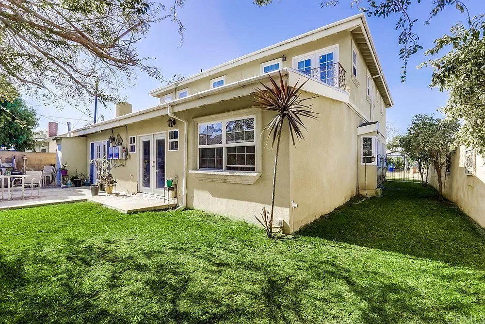 15604 Deblynn Avenue Gardena, CA 90248 - Photo 13 of 22 a view of a house with a yard and sitting area