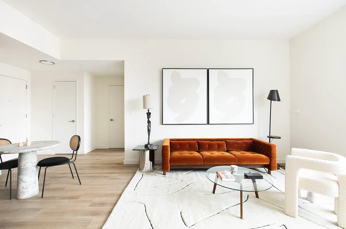 8 Palmetto Street, Unit 512 Brooklyn, NY 11221 - Photo 3 of 15 a living room with furniture and a window