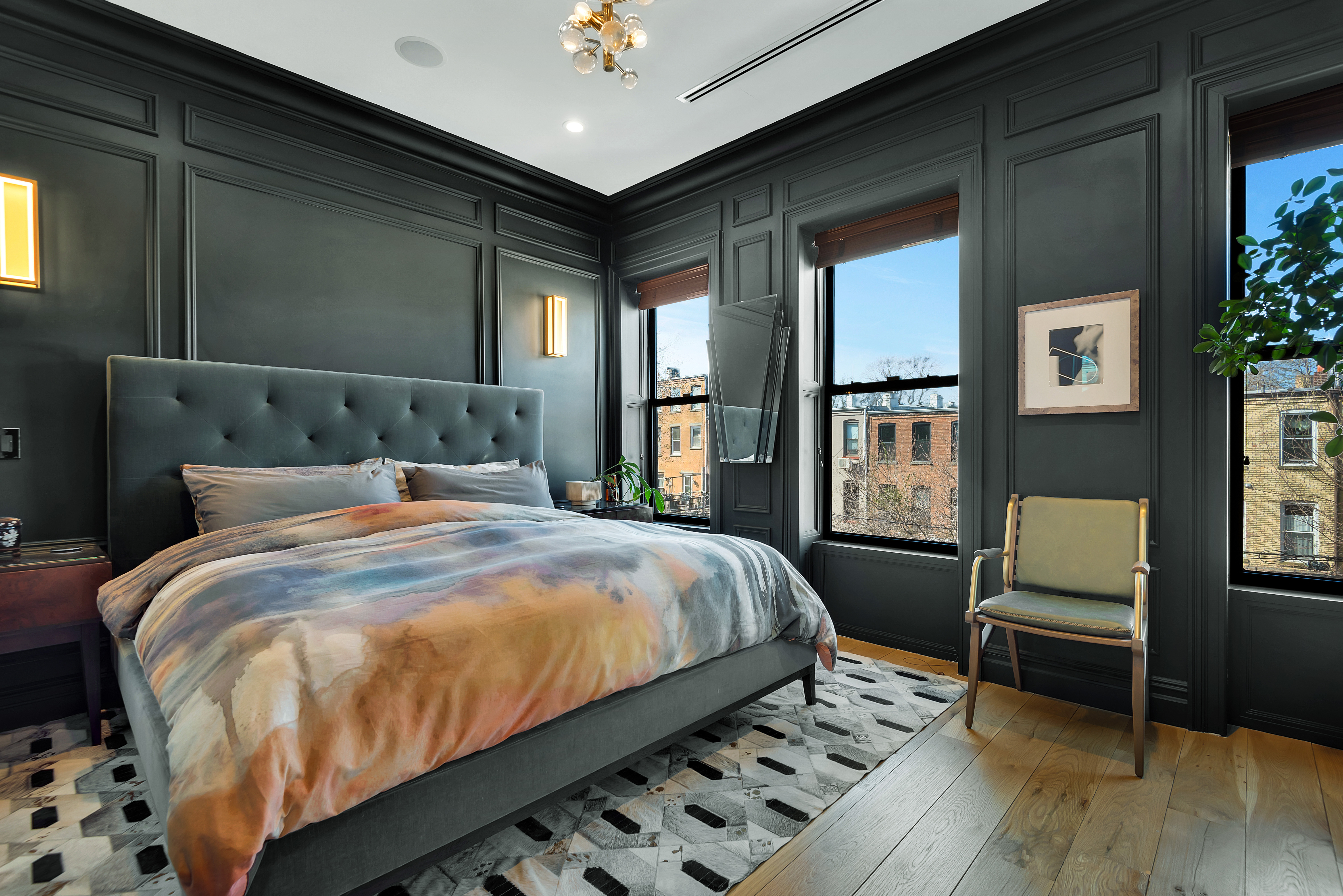 533 Decatur Street, Unit 1 Brooklyn, NY 11233 - Photo 11 of 20 a bed sitting in a bedroom next to a window