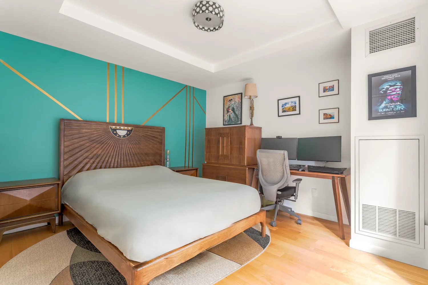 a bedroom with a bed and a chair