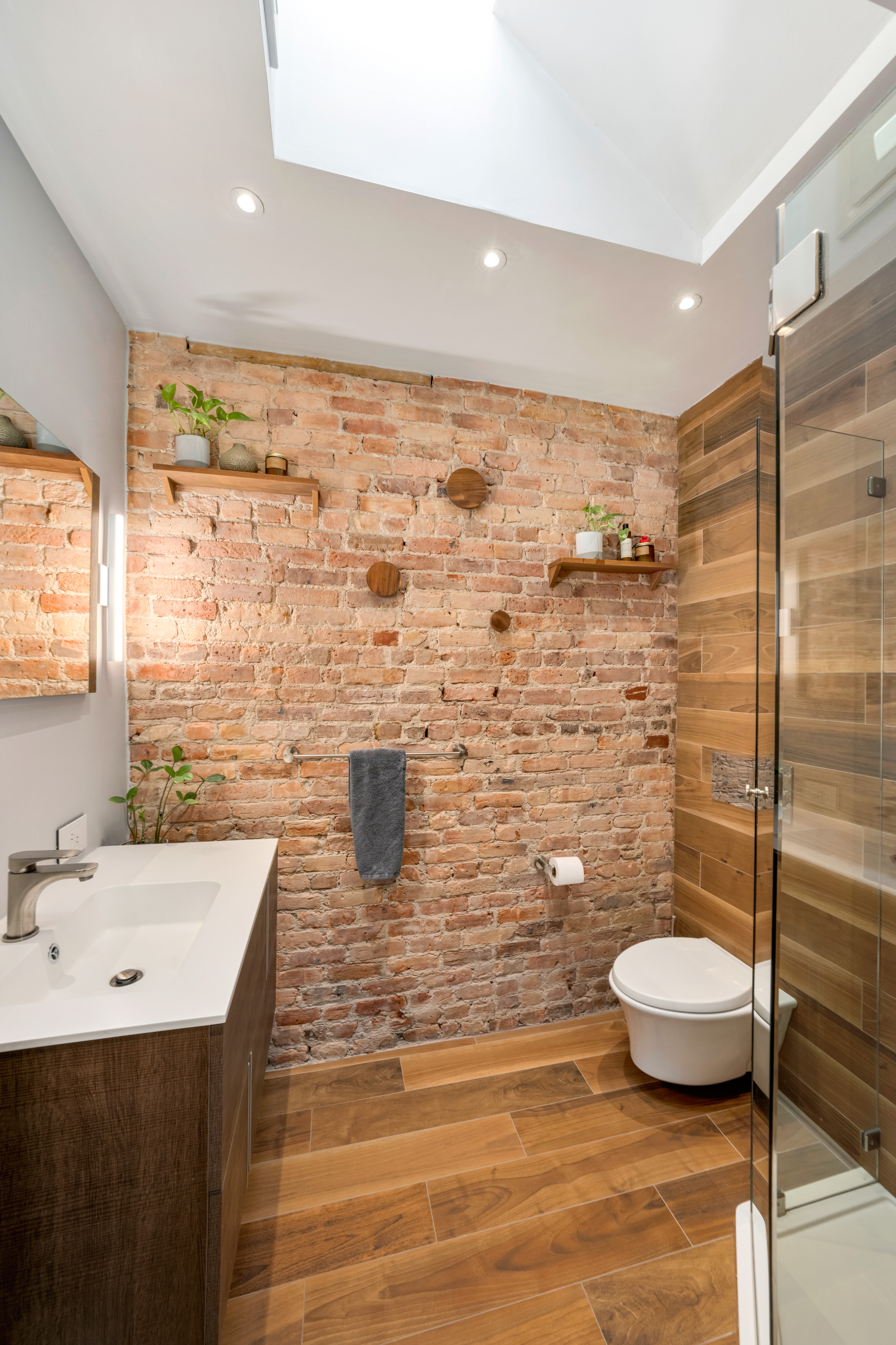 535 Clinton Street, Unit 4A Brooklyn, NY 11231 - Photo 7 of 10 a bathroom with a toilet sink and shower