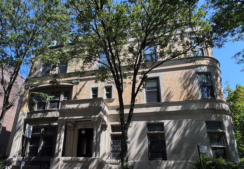 320 Convent Avenue Manhattan, NY 10031 - Photo 2 of 15 a view of a house with a tree