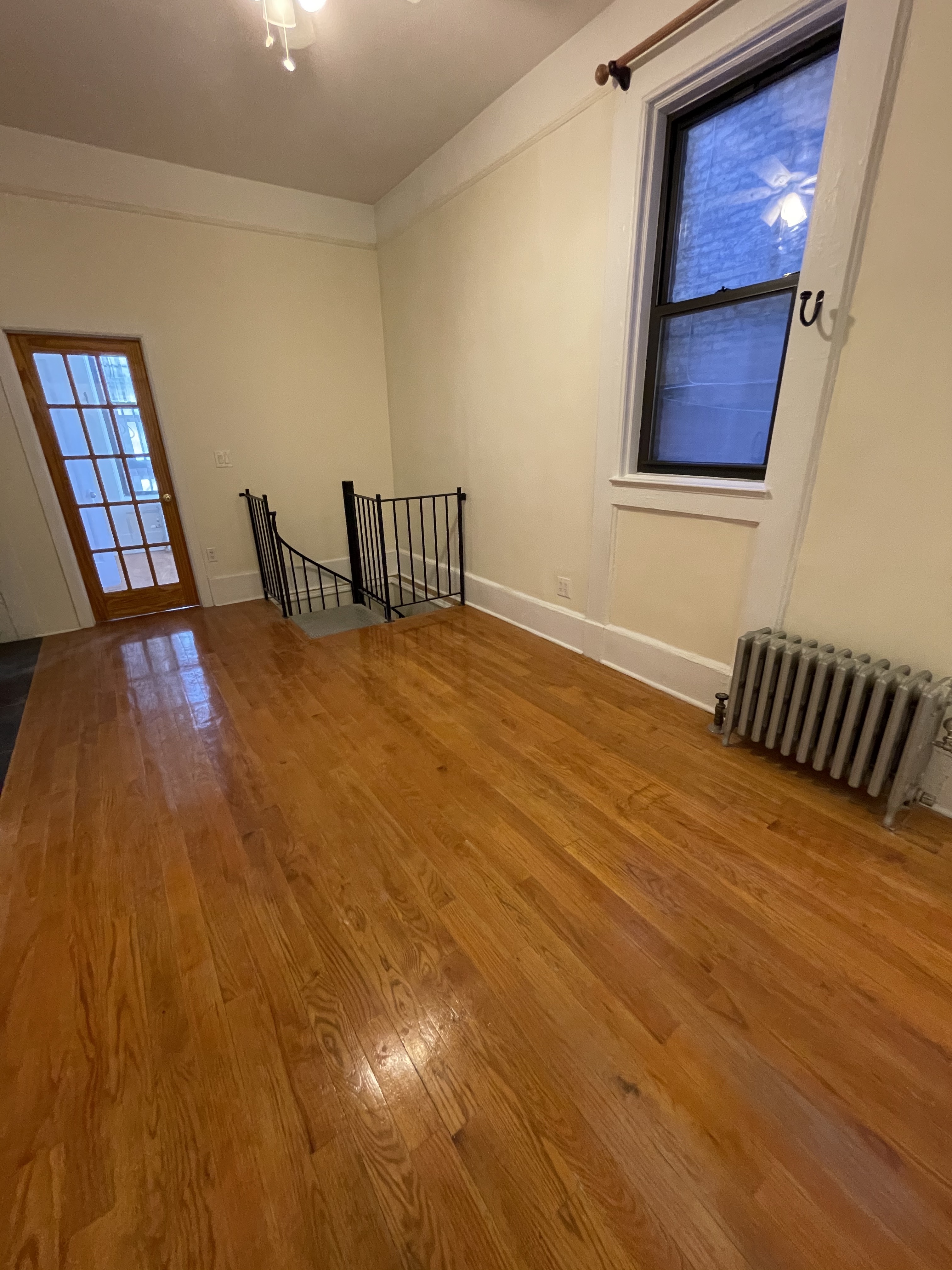 357 Sterling Place, Unit A2 Brooklyn, NY 11238 - Photo 2 of 8 a view of an empty room with window