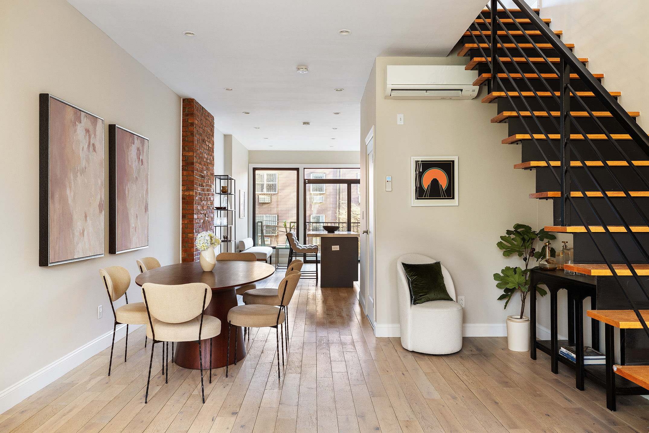 34 Woodbine Street Brooklyn, NY 11221 - Photo 3 of 15 a living room with furniture and wooden floor