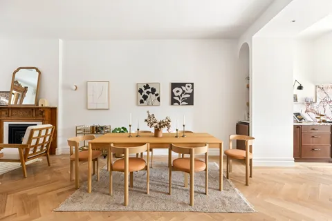 a view of a dining room with furniture