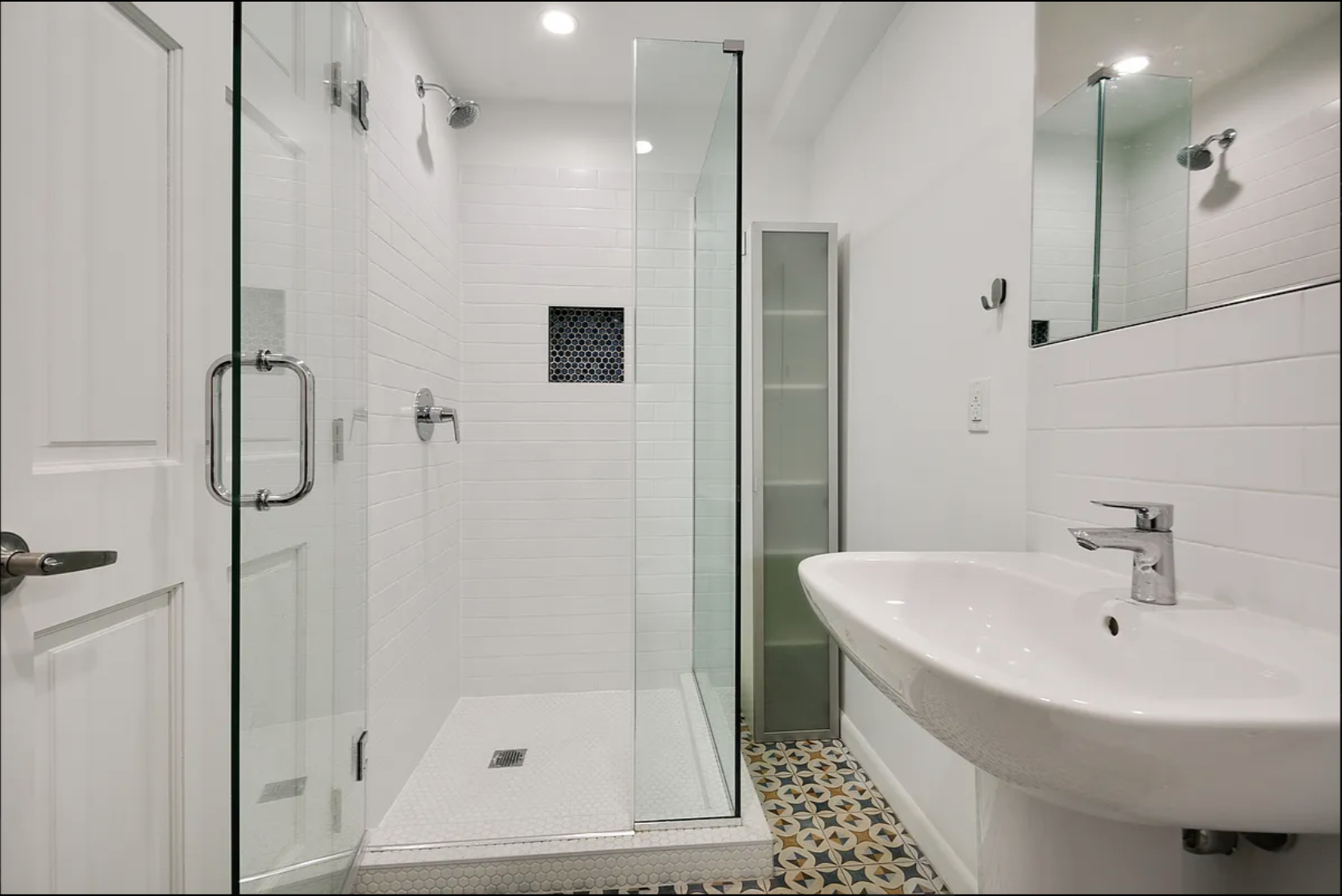 430 East 140th Street, Unit 2 Bronx, NY 10454 - Photo 6 of 10 a bathroom with a bathtub and a shower