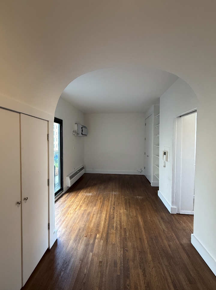 455 Park Avenue South, Unit PH1 Manhattan, NY 10016 - Photo 7 of 17 a view of a room with wooden floors and window